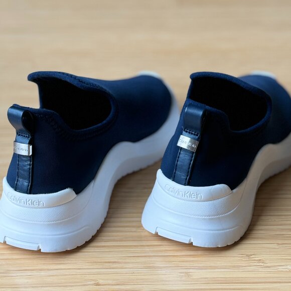 Calvin Klein | Shoes | Calvin Klein Womens Ursa Slipon  Calvin Klein Womens Ursa Slip-On Sneakers, Dark Navy Neoprene, Size 7, Brand New